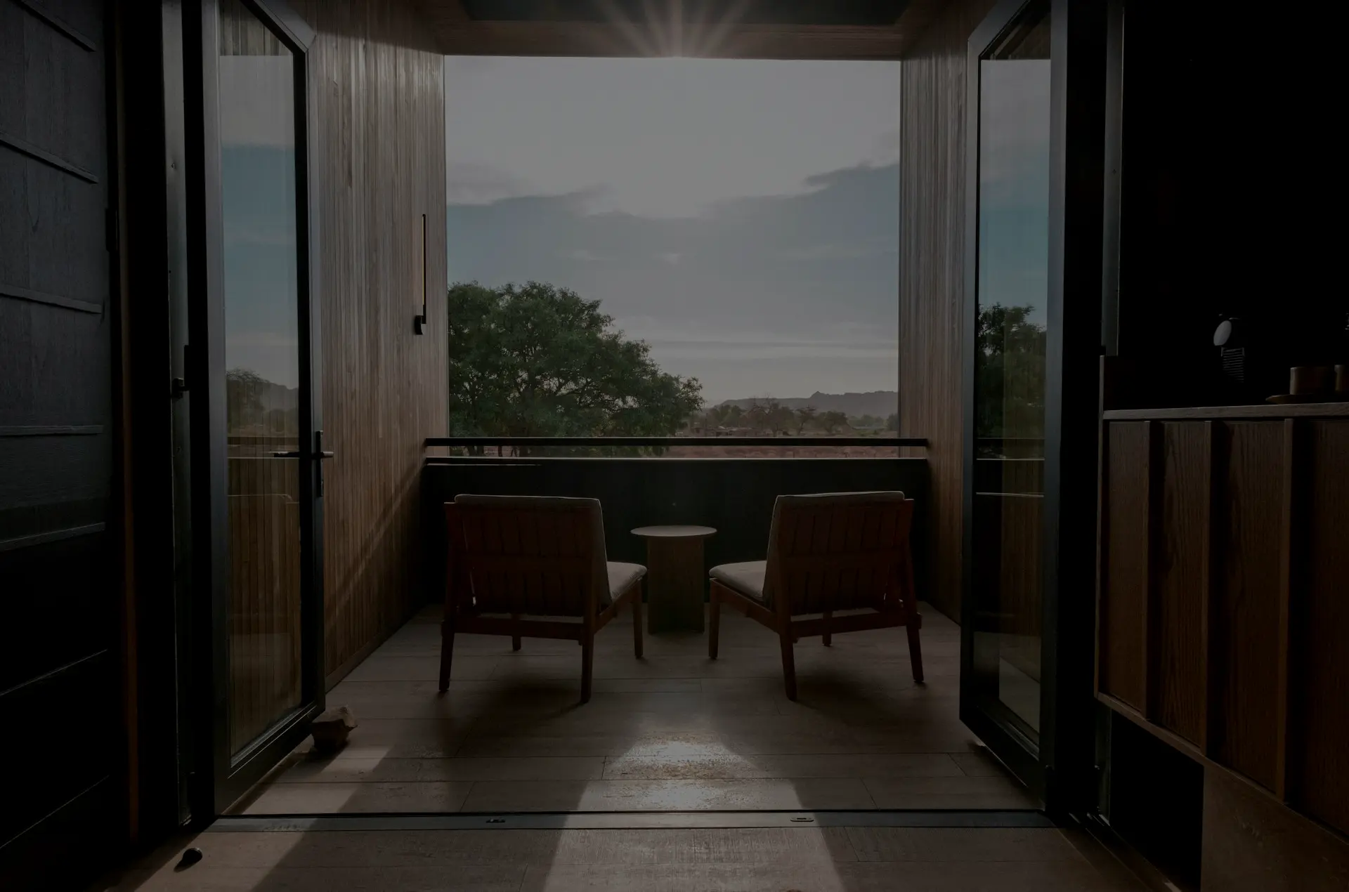 A couple of chairs that are sitting in a room